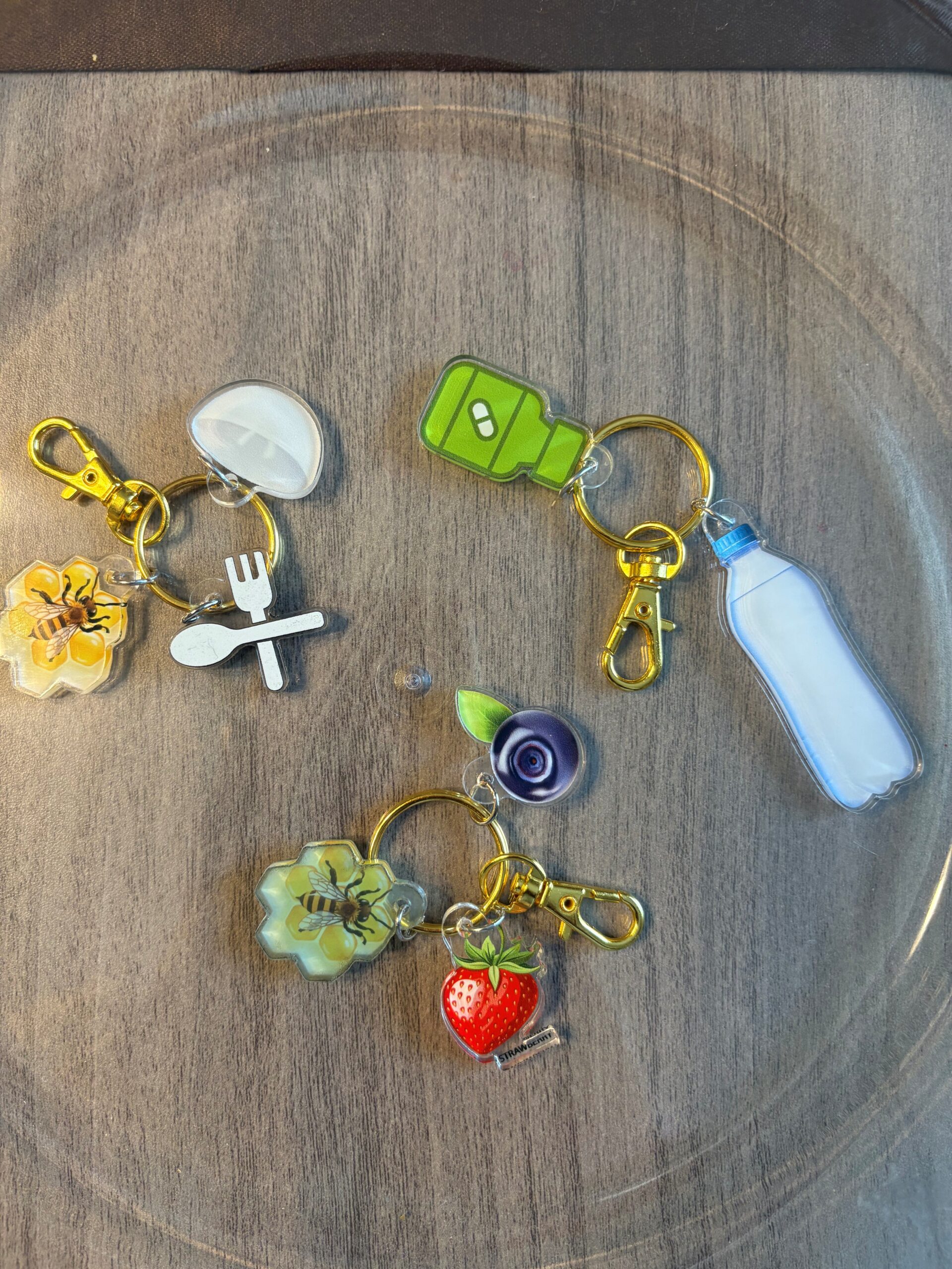 The BariGirls Bari Hive Key Chain with Variable Charms